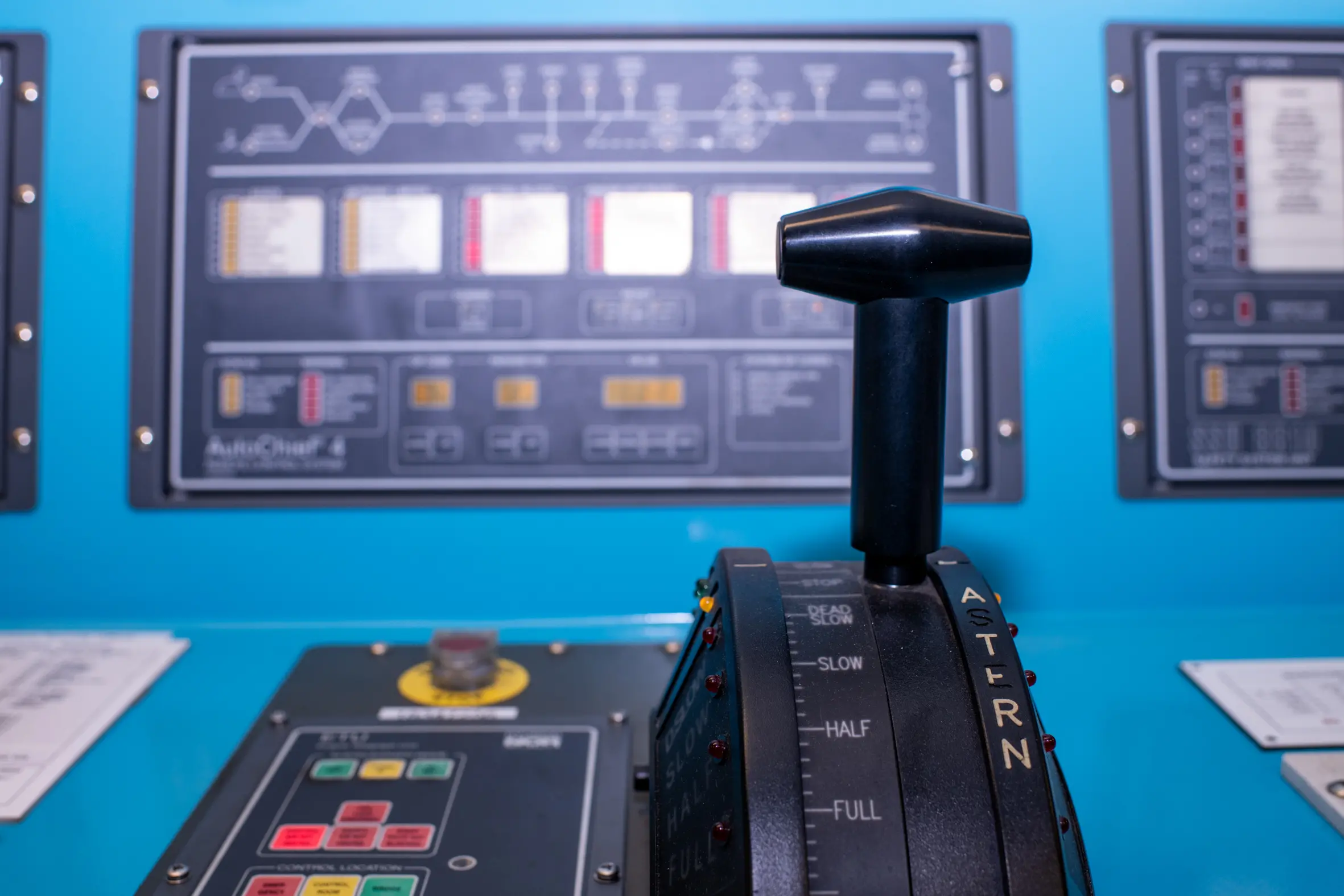 A black control lever labeled "STOP," "SLOW," "HALF," and "FULL" with “ASTER” clearly visible. The panels read "AutoChart 4" and "Control Location."